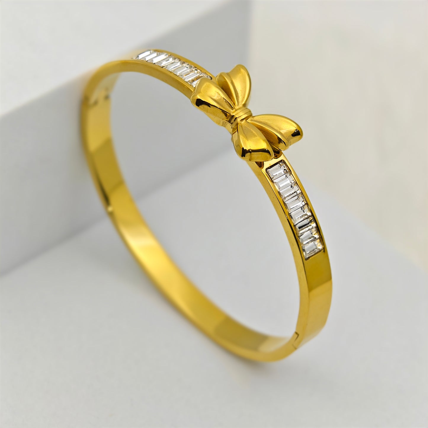 Luxury 22K Gold-Plated Bow Charm Bracelet – Anti-Tarnish Stainless Steel Bangle with Baguette CZ Accents RGB444