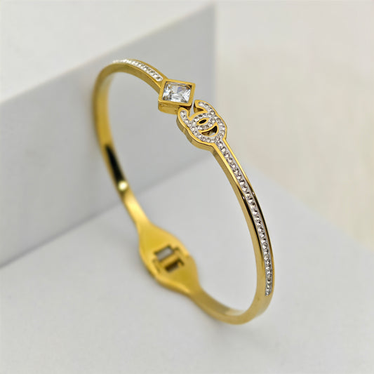 Luxury 22K Gold-Plated Designer Channel Engraved CZ Bracelet – Anti-Tarnish Stainless Steel Bangle with Square & Pave Crystal Accents RGB453