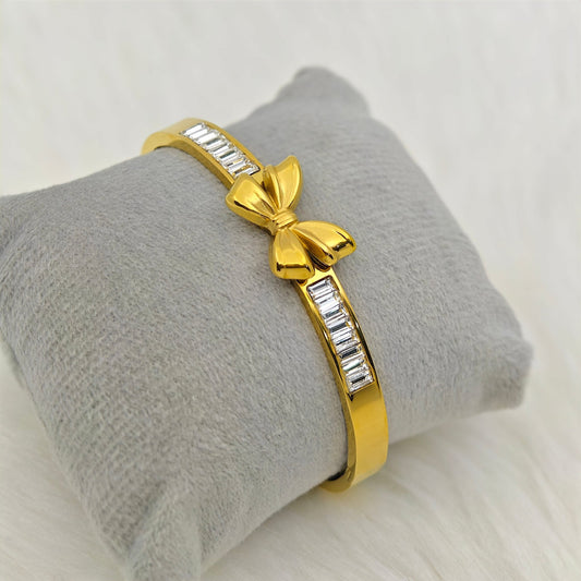 Luxury 22K Gold - Plated Bow Charm Bracelet – Anti - Tarnish Stainless Steel Bangle with Baguette CZ Accents RGB444 - The Soul Jewellery