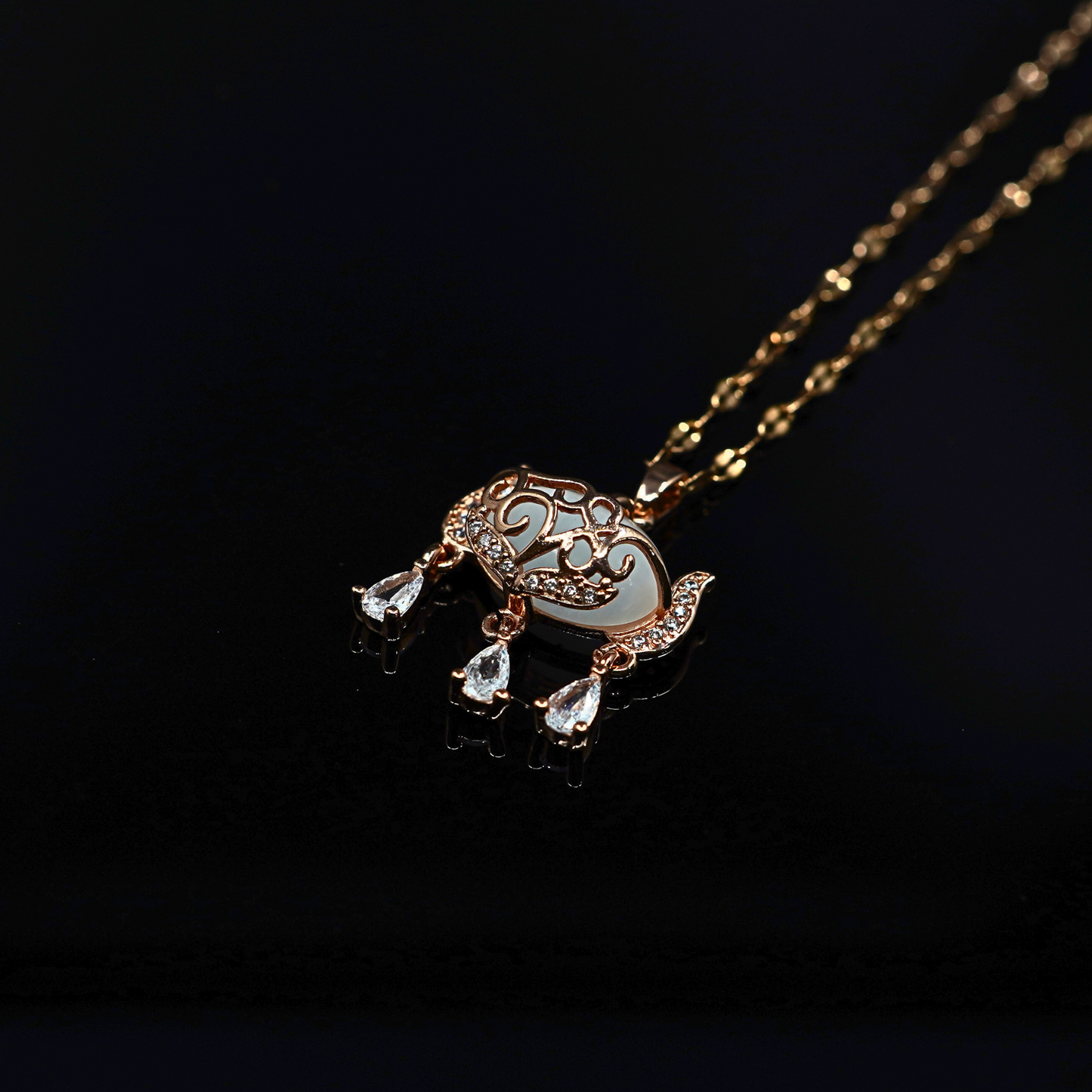 Enchanting Elegance: 18K Gold-Plated White Stone Necklace with CZ-Studded Pendant ATCP102