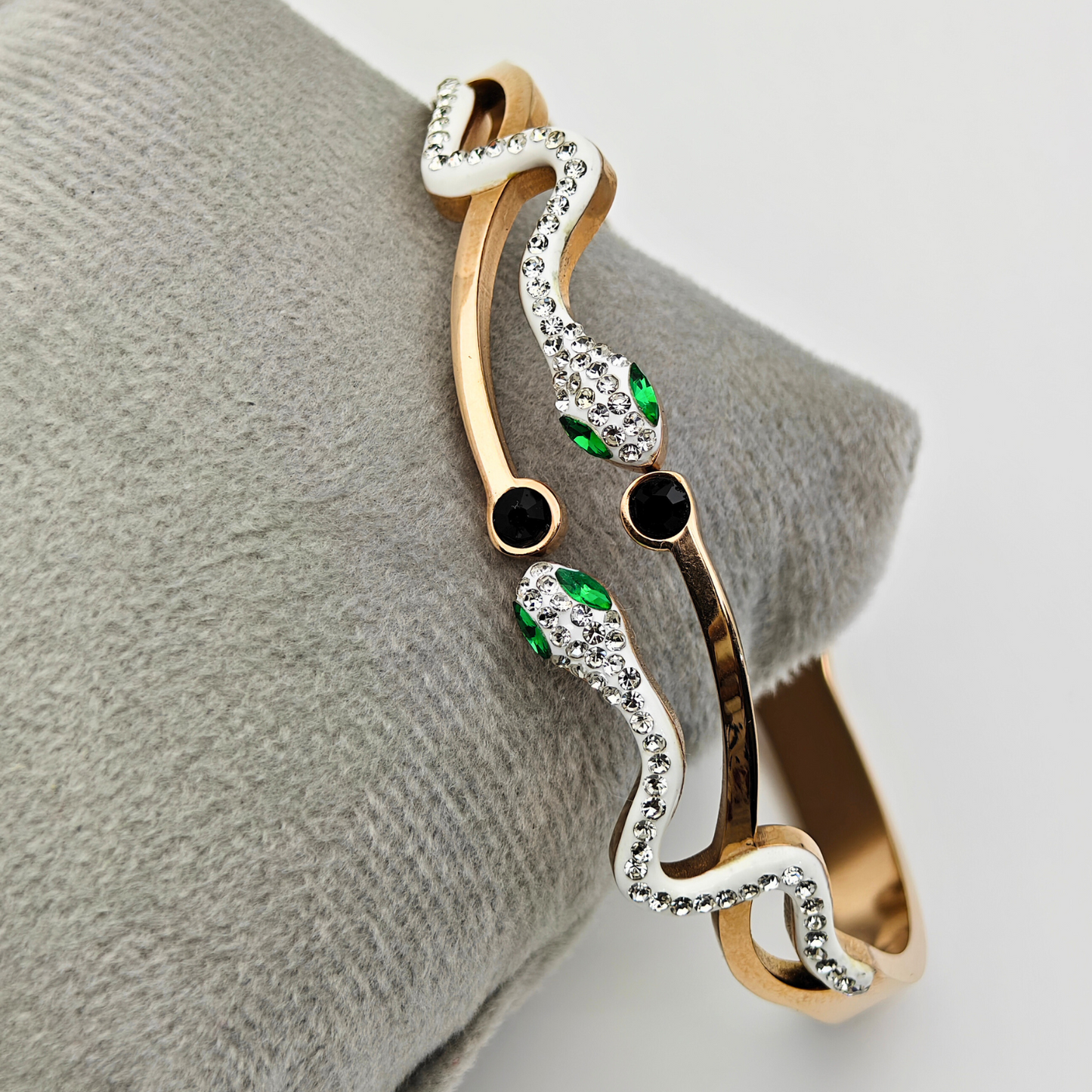 Enchanted Serpentine: 18K Gold Plated Snake Bangle with Emerald Eyes and Crystal Accents RGB222