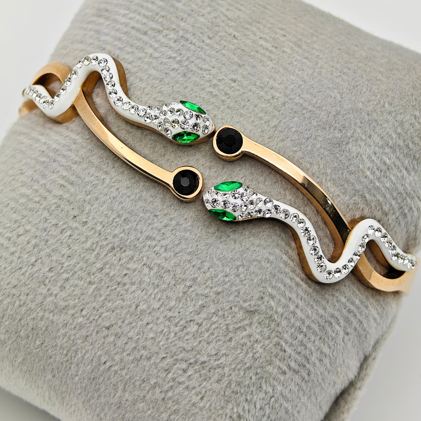 Enchanted Serpentine: 18K Gold Plated Snake Bangle with Emerald Eyes and Crystal Accents RGB222