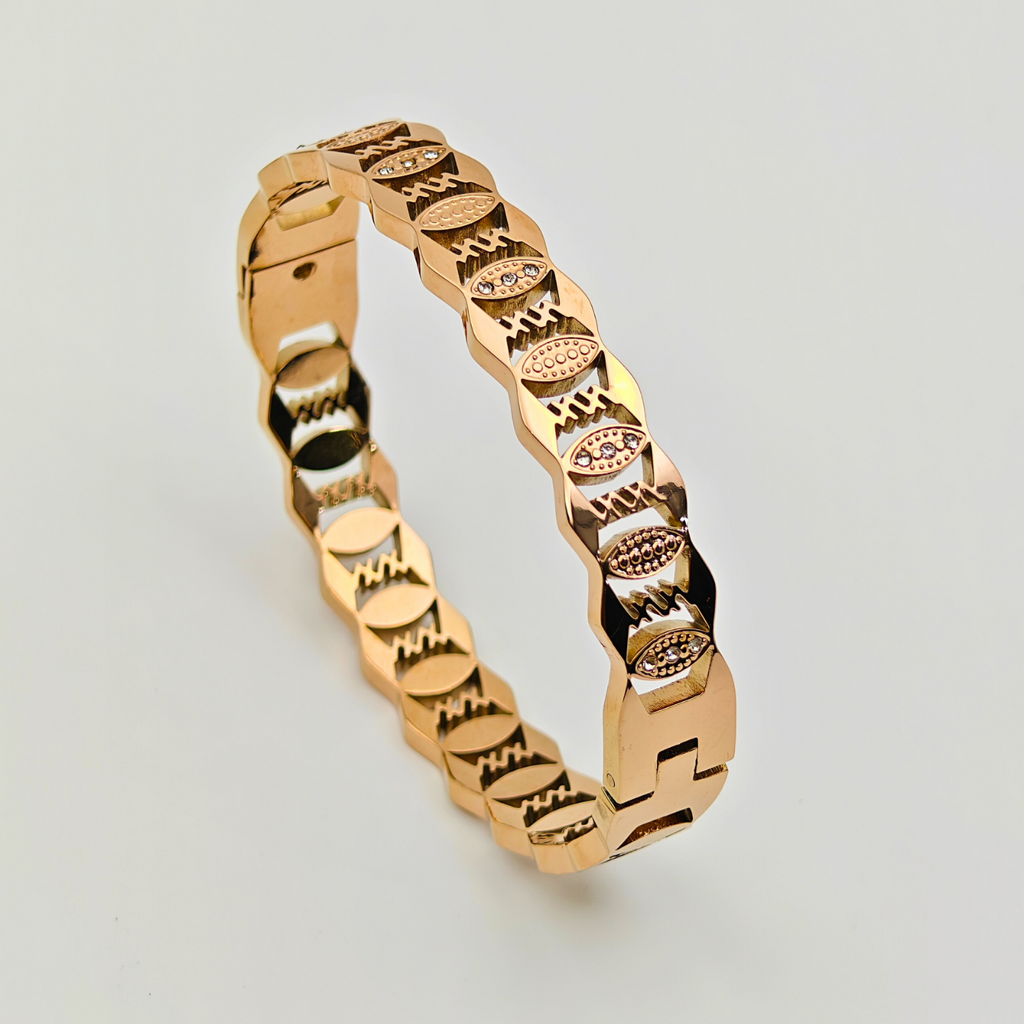 Geometric Glam: 18K Gold Plated Bangle with Intricate Patterns and CZ Inlays RGB208