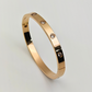 Sleek Elegance: 18K Rose Gold Plated Bangle with Crystal Accents RGB209