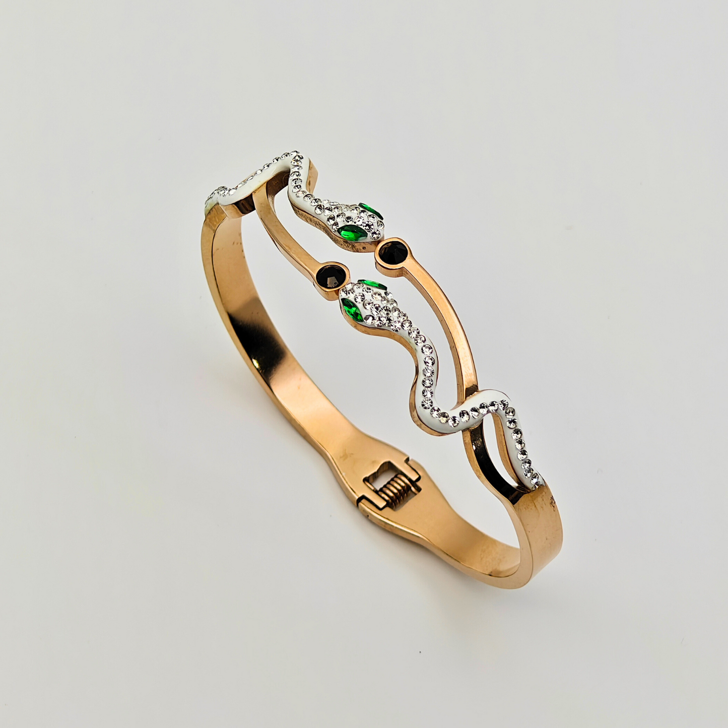 Enchanted Serpentine: 18K Gold Plated Snake Bangle with Emerald Eyes and Crystal Accents RGB222