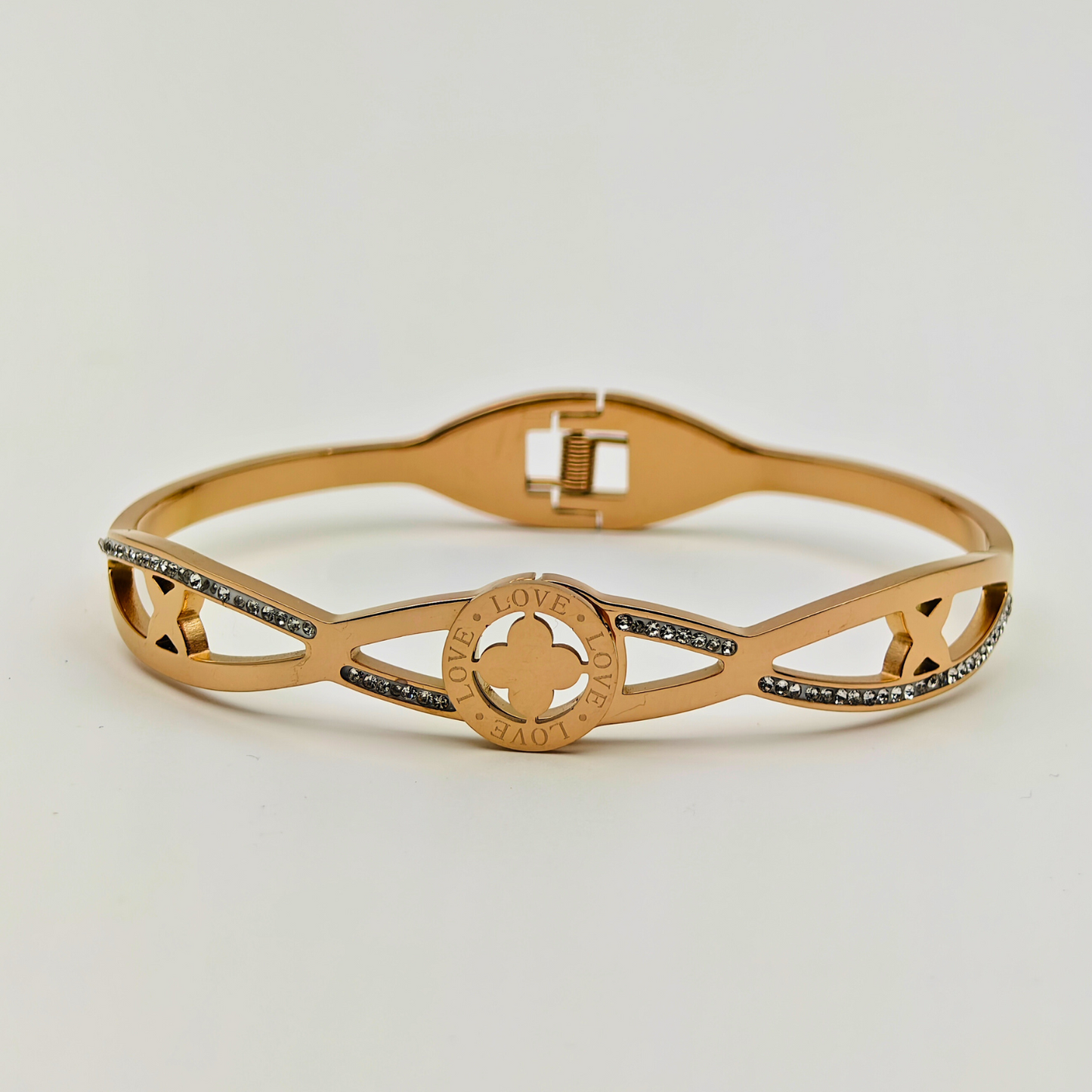 Elegant Harmony: 18K Gold Plated Bangle with Interlocking Charms and CZ Details RGB207