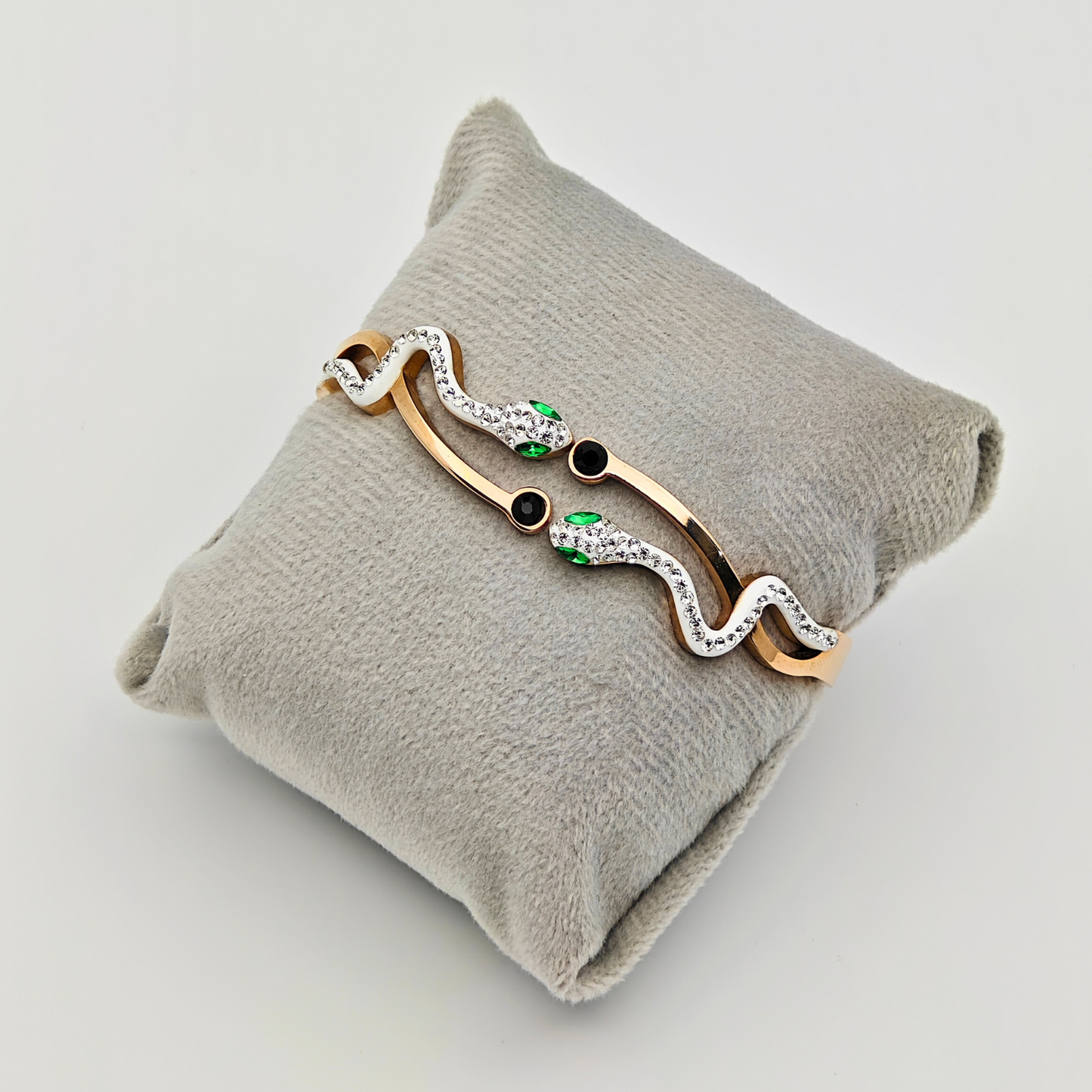 Enchanted Serpentine: 18K Gold Plated Snake Bangle with Emerald Eyes and Crystal Accents RGB222