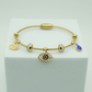 Elegant Gold-Plated Evil Eye Charm Bangle with Crystal Accents and Blue Teardrop Pendant RGB401