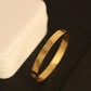 8K Gold Plated Anti-Tarnish Bracelet with Sacred Om Engraving | Unisex Spiritual Energy Bangle | Stainless Steel | Lucky for Wealth & Protection