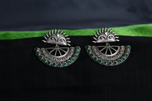 Surya Motif Premium German Silver Earrings with green Stones