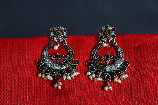 Dual Tone German Silver Jhumka with Red & Green Stones and Elegant Pearl Drops