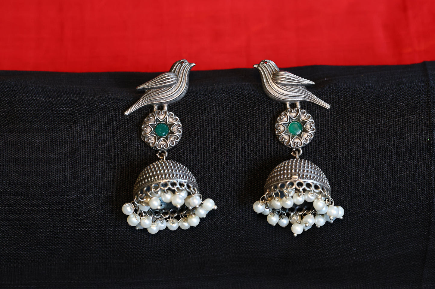 Bird Motif Oxidized Silver Replica Jhumka with Green Stones and Pearl Drops