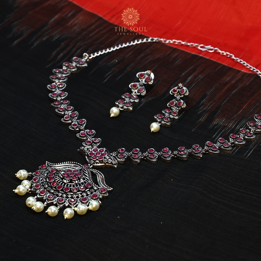 German Silver-Plated Necklace and Earrings Embellished with Red Gemstones and Pearl Drops