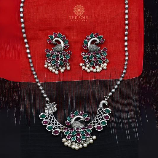 German Silver-Plated Peacock Necklace set with Red & Green Gemstones and Gleaming Pearl Drops