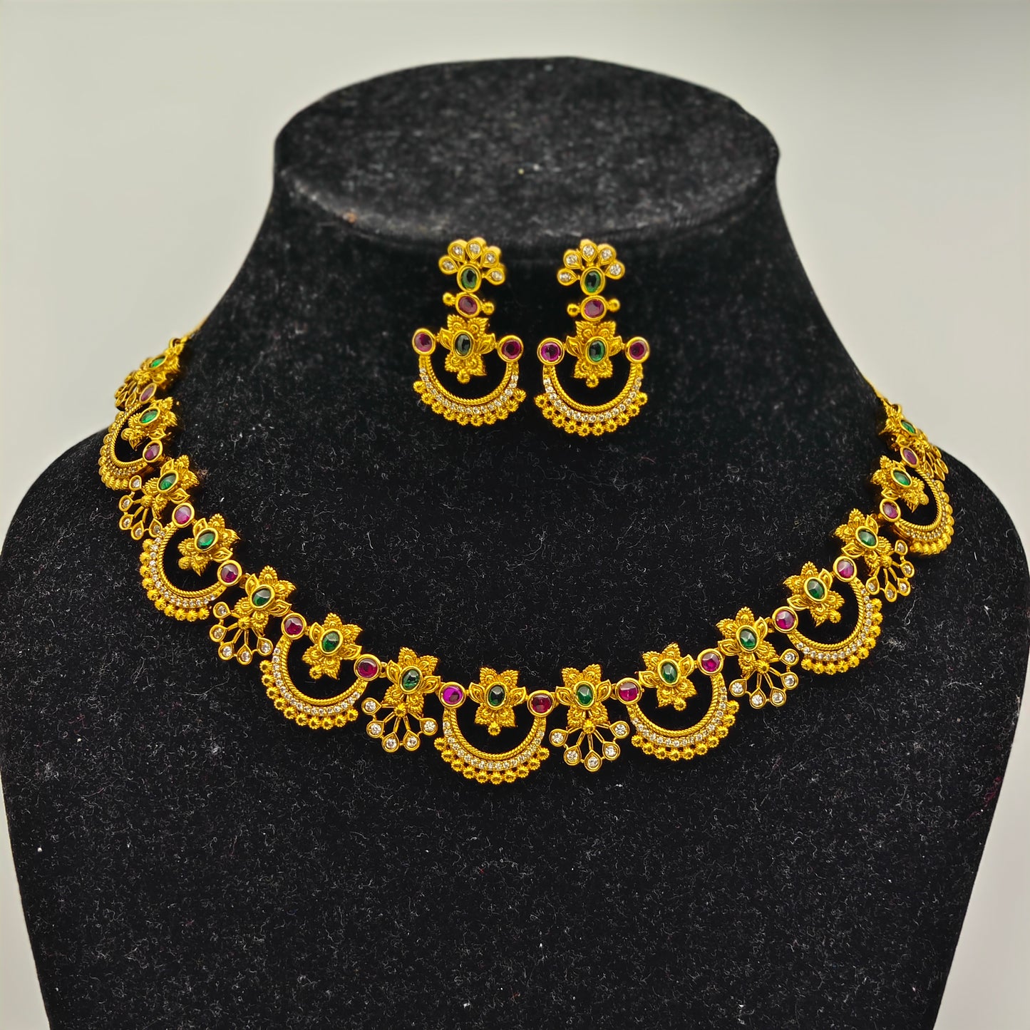 Antique Gold Plated Vinayaka Necklace Earrings Set with Floral Motifs and Gemstone Accents – Traditional Temple Jewelry MGNS304