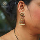 Arunima Antique Matte Gold Plated Jhumka Earrings