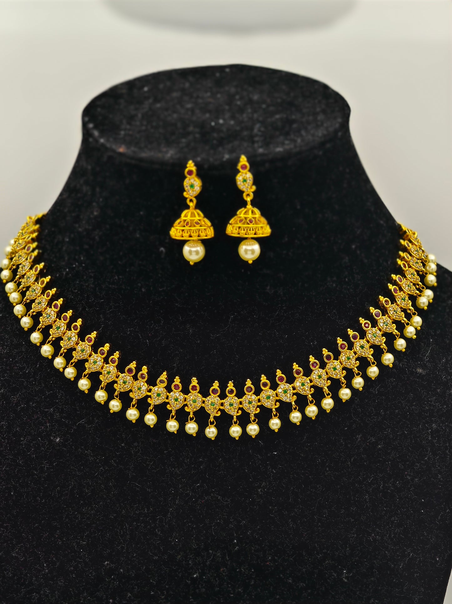 Nirupa Antique Gold Plated Temple Choker Necklace Set with Pearl Drops and Ruby Accents – Traditional Ethnic Jewelry MGNC308