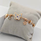 Charming 18K Gold Plated Anti-Tarnish Bangle with Butterfly and Floral Charms RGB252