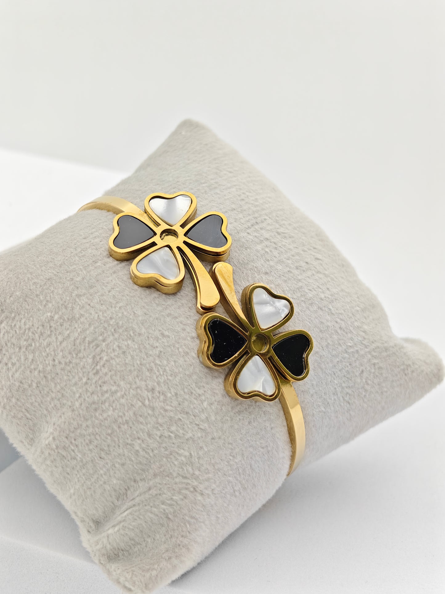 Elegant 18K Gold Plated Clover Bangle with Black and White Enamel Accents RGB255