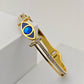 Elegant 18K Gold Plated Evil Eye Bangle with Blue Enamel and Crystal Accents RGB257