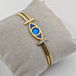 Elegant 18K Gold Plated Evil Eye Bangle with Blue Enamel and Crystal Accents RGB257