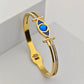 Elegant 18K Gold Plated Evil Eye Bangle with Blue Enamel and Crystal Accents RGB257