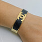 Luxury 18K Gold Plated Channel Logo Engraved Bangle with Black Leather Inlay – Anti-TarnishBracelet for Elegant Style RGB263