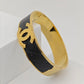 Luxury 18K Gold Plated Channel Logo Engraved Bangle with Black Leather Inlay – Anti-TarnishBracelet for Elegant Style RGB263