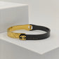 Chic Black and Gold Anti-Tarnish Bangle with Chanel-Inspired Design and Dual-Tone Finish RGB269