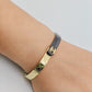 Chic Black and Gold Anti-Tarnish Bangle with Chanel-Inspired Design and Dual-Tone Finish RGB269