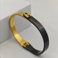 Chic Black and Gold Anti-Tarnish Bangle with Chanel-Inspired Design and Dual-Tone Finish RGB269