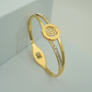 Luxury 18K Gold Plated Anti-Tarnish Emblem Bangle with Crystal Accents – Elegant Openable Design RGB309