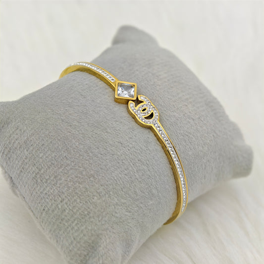 Luxury 22K Gold-Plated Designer Channel Engraved CZ Bracelet – Anti-Tarnish Stainless Steel Bangle with Square & Pave Crystal Accents RGB453