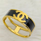 Luxury 18K Gold Plated Anti-Tarnish Bangle – Bold Black Enamel Designer Bracelet with Engraved Channel-Inspired Logo RGB511