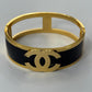 Luxury 18K Gold Plated Anti-Tarnish Bangle – Bold Black Enamel Designer Bracelet with Engraved Channel-Inspired Logo RGB511