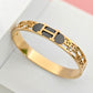 Hermes Engraved 18K Gold Plated Initial Bangle with Black Enamel and Crystal Details – Sophisticated and Stylish RGB288