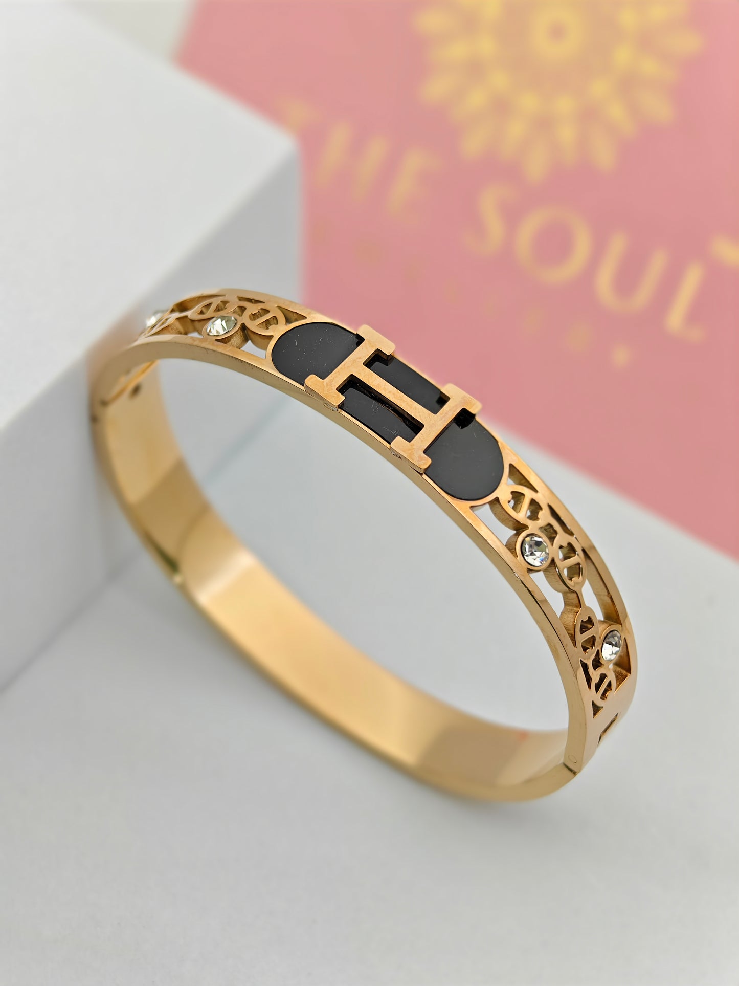 Hermes Engraved 18K Gold Plated Initial Bangle with Black Enamel and Crystal Details – Sophisticated and Stylish RGB288