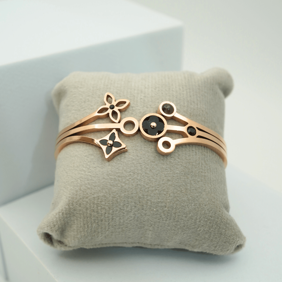 Luxury 18K Rose Gold Plated Anti - Tarnish Floral Charm Bangle with Black Enamel Accents – Elegant Openable Design RGB306 - The Soul Jewellery
