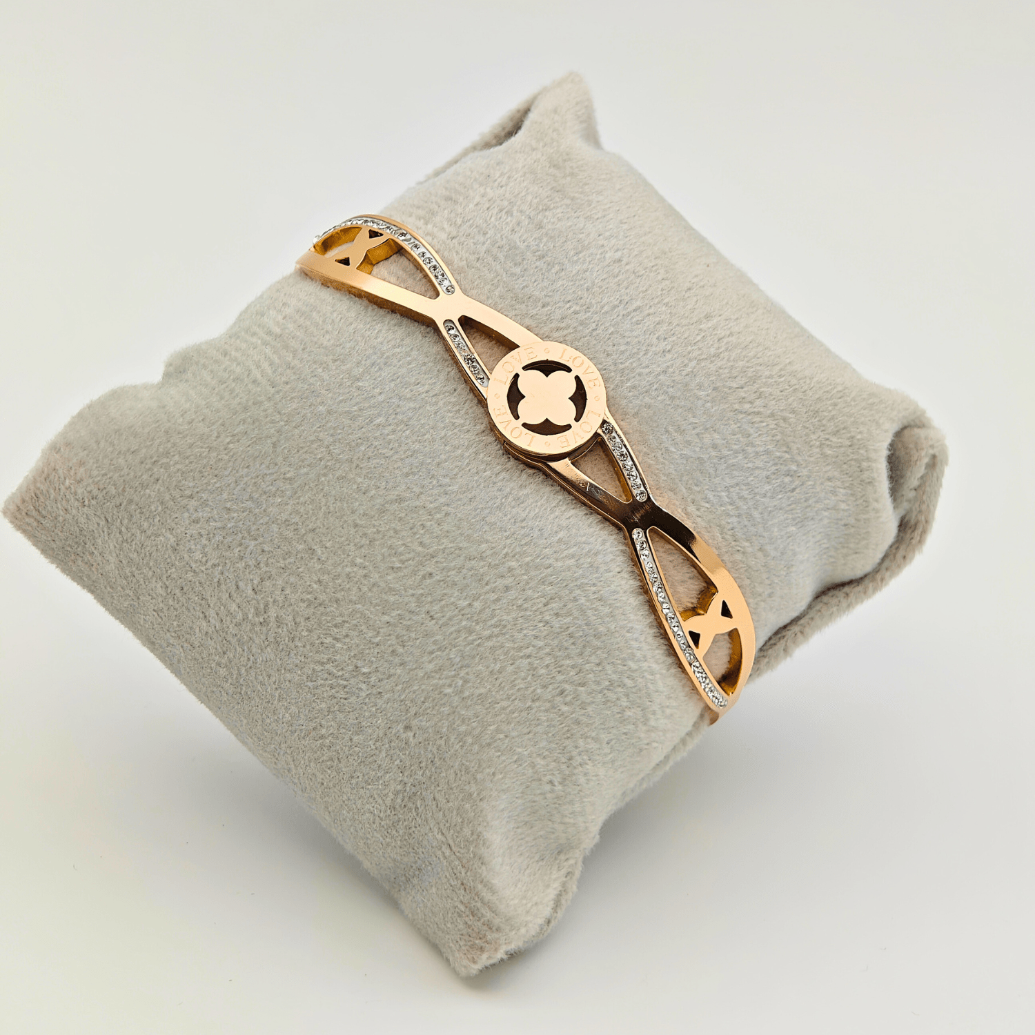 Elegant Harmony: 18K Gold Plated Bangle with Interlocking Charms and CZ Details RGB207 - The Soul Jewellery