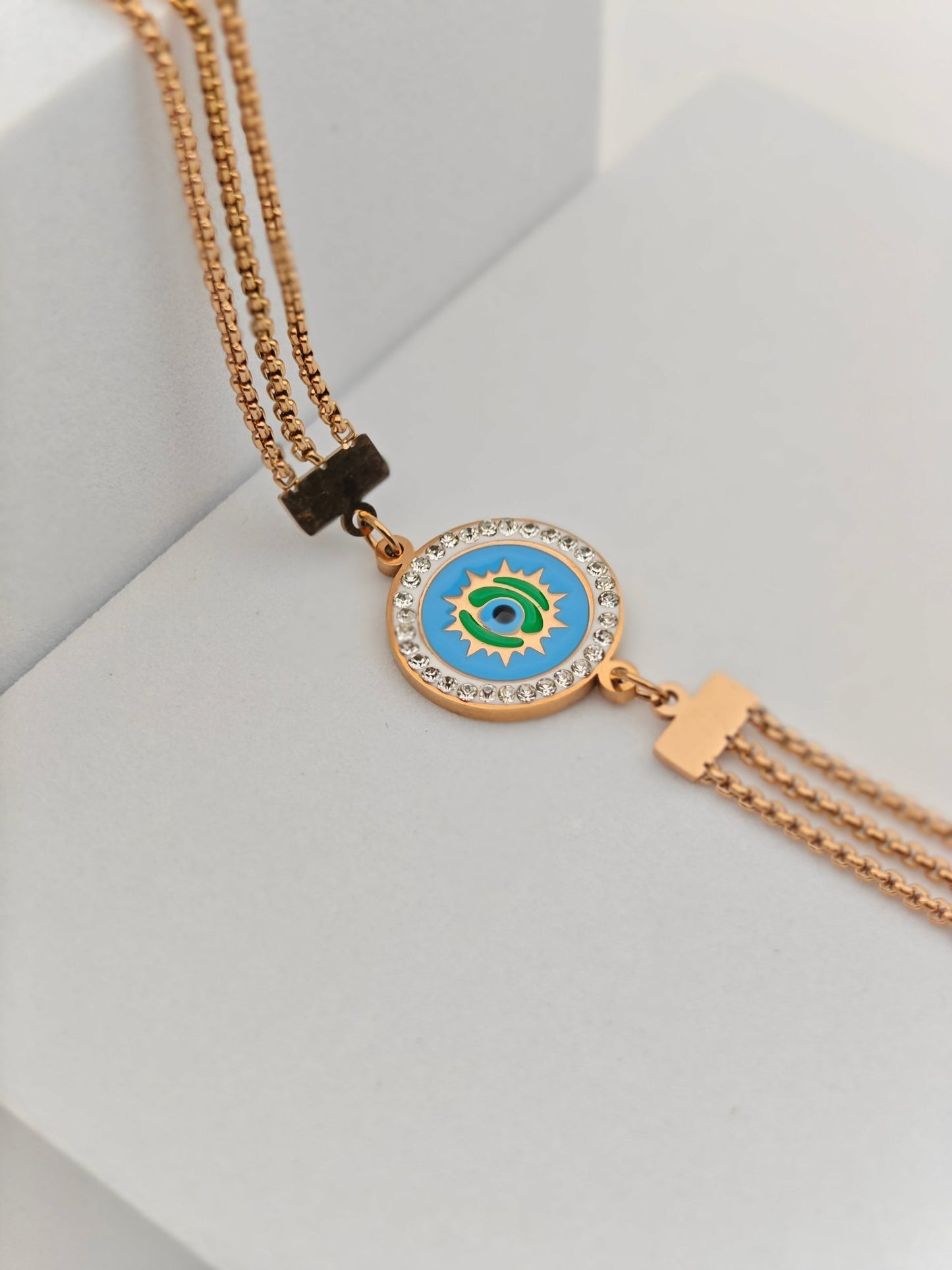 Elegant Rose Gold Plated Anti - Tarnish Bracelet with Blue Enamel Evil Eye Charm and Crystal Accents - The Soul Jewellery