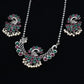 German Silver - Plated Peacock Necklace set with Red & Green Gemstones and Gleaming Pearl Drops - The Soul Jewellery