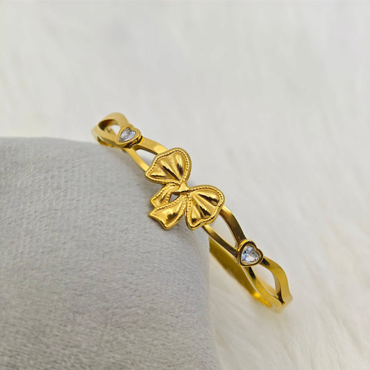 Elegant 18K Gold - Plated Bow Charm Bracelet – Anti - Tarnish Stainless Steel Bangle with Heart - Shaped Crystal Accents RGB425 - The Soul Jewellery