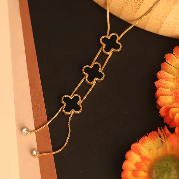 Elegant Black & Gold Clover Pendant Necklace for Women – Adjustable Layered Chain Statement Jewelery- The Soul Jewellery