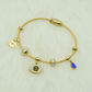 Elegant Gold - Plated Evil Eye Charm Bangle with Crystal Accents and Blue Teardrop Pendant RGB401 - The Soul Jewellery