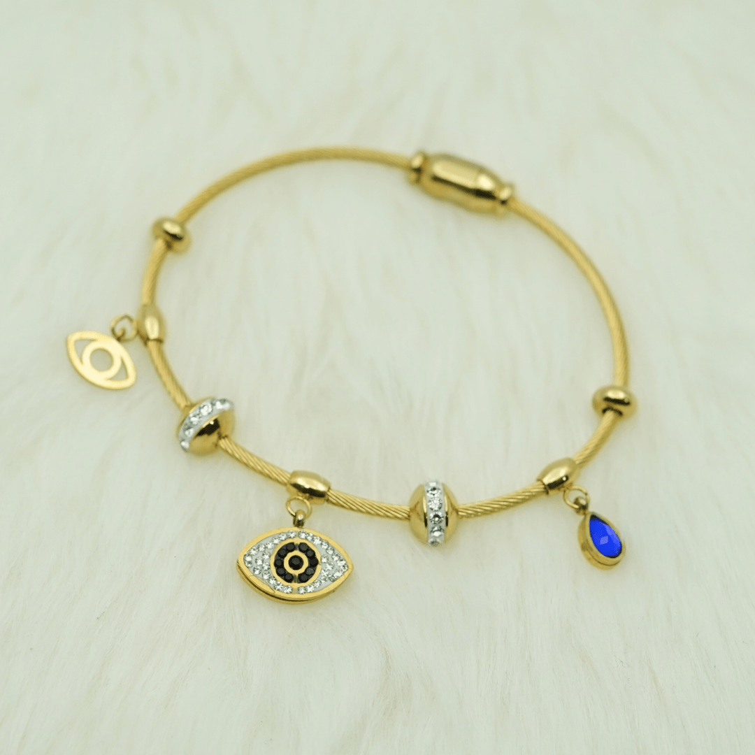 Elegant Gold - Plated Evil Eye Charm Bangle with Crystal Accents and Blue Teardrop Pendant RGB401 - The Soul Jewellery