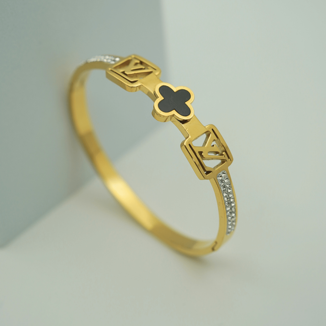18K Gold - Plated Anti - Tarnish Bangle with Black Clover Design and Sparkling Crystal Highlights RGB355 - The Soul Jewellery