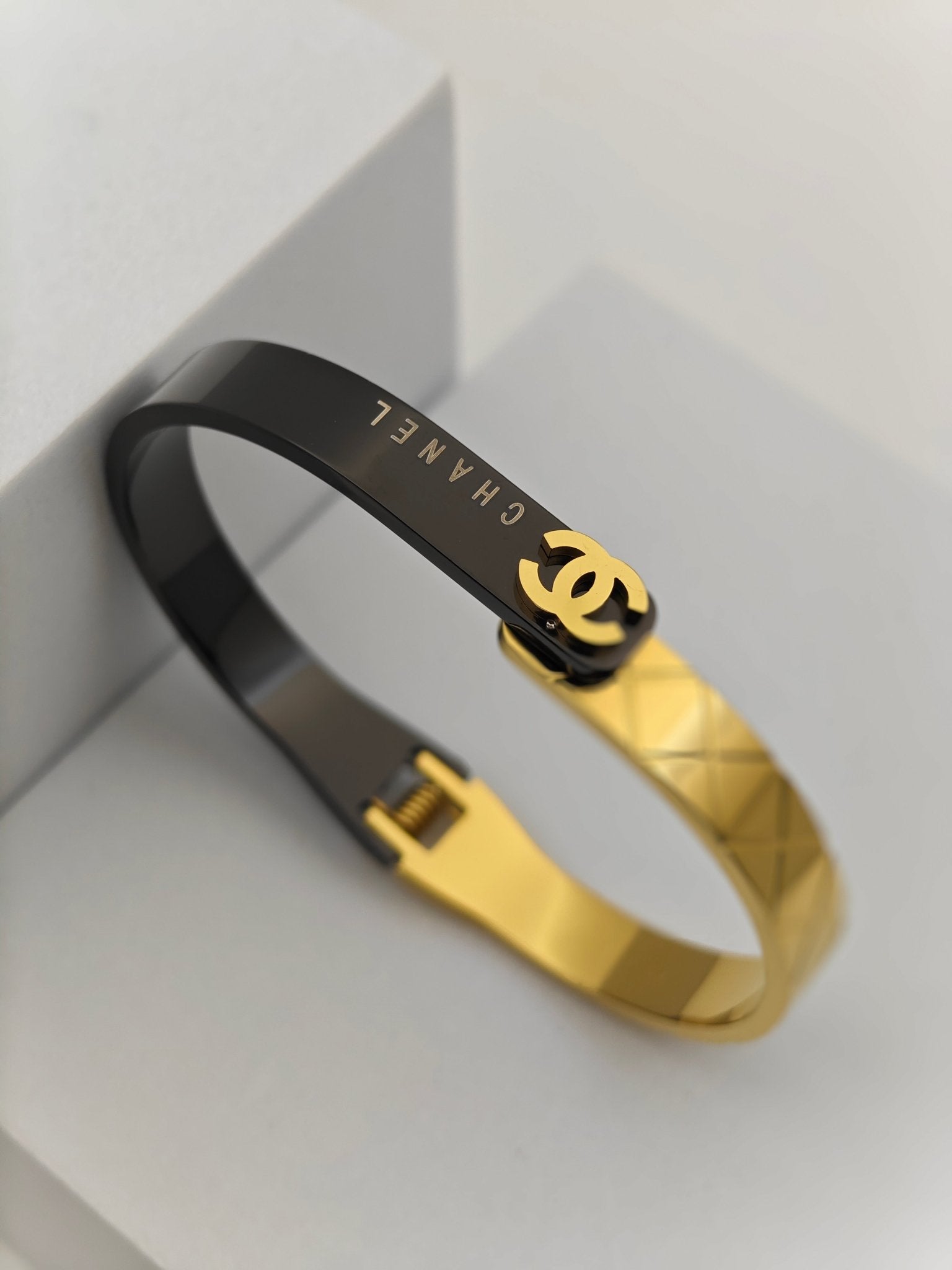 Chic Black and Gold Anti - Tarnish Bangle with Chanel - Inspired Design and Dual - Tone Finish RGB269 - The Soul Jewellery