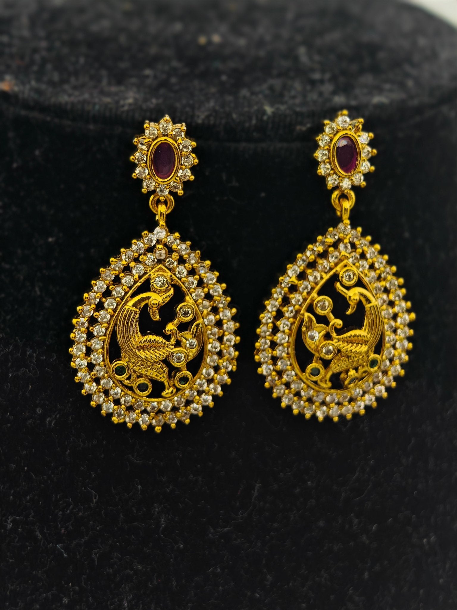 Aloka Antique Gold Plated Temple Necklace Set with Intricate Peacock Pendant and Ruby Accents – Traditional Ethnic Jewelry MGNS310 - The Soul Jewellery