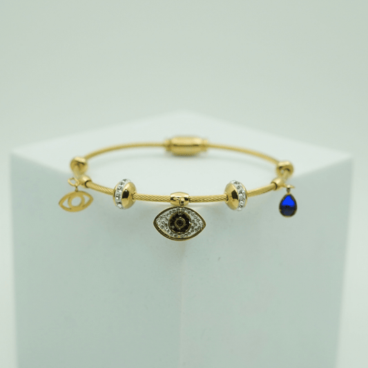 Elegant Gold - Plated Evil Eye Charm Bangle with Crystal Accents and Blue Teardrop Pendant RGB401 - The Soul Jewellery