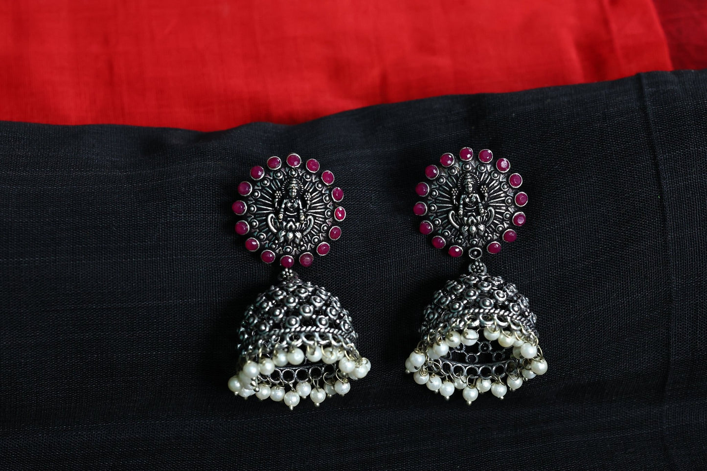 German Silver Lakshmi Jhumka Earring with Red Stones and Pearls - The Soul Jewellery